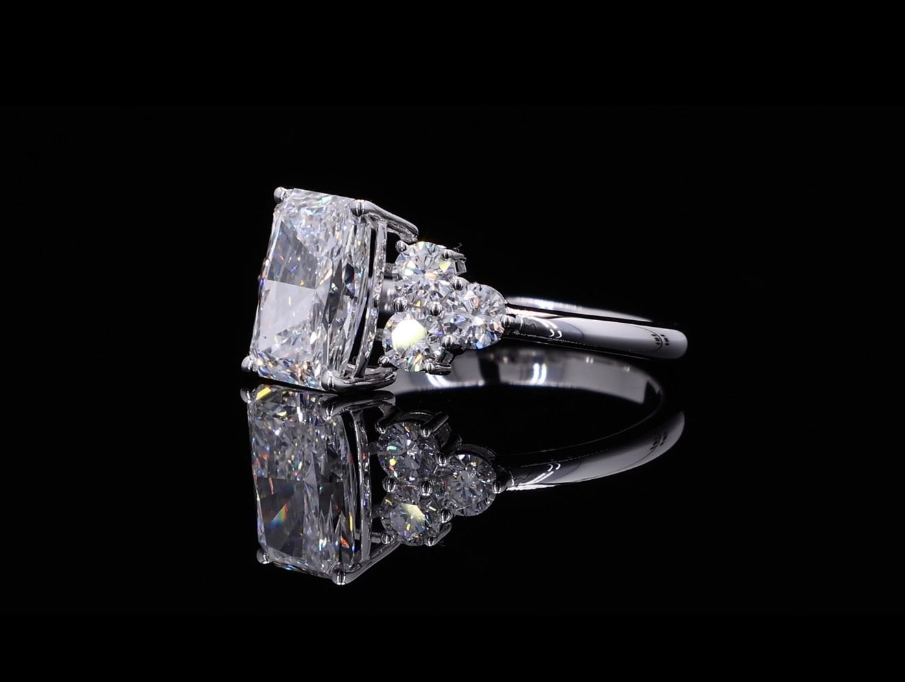 Radiant Cut Diamond Ring with Round Diamond Accents